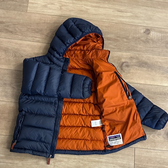 Patagonia Dark Blue Puffer Jacket with Bright Orange Interior - Picture 2 of 4